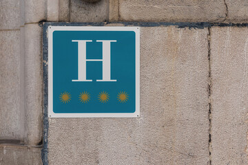 Hotel blue sign. Four stars.