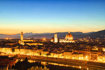 Fototapeta na wymiar Florence Aerial View at Golden Sunset over Palazzo Vecchio and Cathedral of Santa Maria del Fiore with Duomo