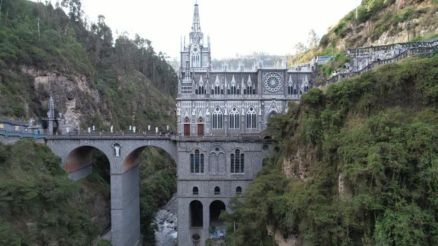 Drone video of the National Shrine Basilica of Our Lady of Las Lajas over the Gu&aacute;itara River in Narino Department of Colombia in Ipiales, considered one of the most beautiful churches in the world