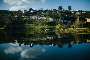 Fototapeta na wymiar View of cottages on the banks of the Douro River, after the rain. Portugal.