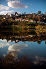 View of the banks of the Douro River, blue sky, Portugal.