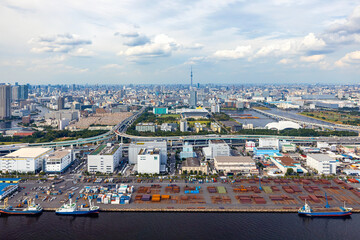 Obraz premium Aerial view of Odaiba Harbor shipping freight docks in Minato City, Tokyo, Japan