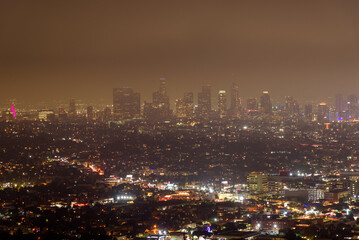 Elevated view of Los Angeles skyline on a foggy autumn night