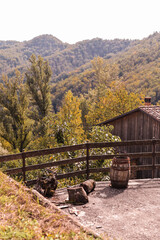 Hills of italy in autumn farm. Forest and old huts in the village. High quality photo