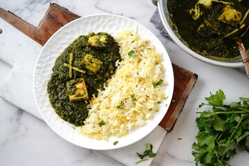 Homemade Palak Paneer or Indian cottage cheese spinach curry served with rice