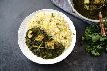Homemade Palak Paneer or Indian cottage cheese spinach curry served with rice