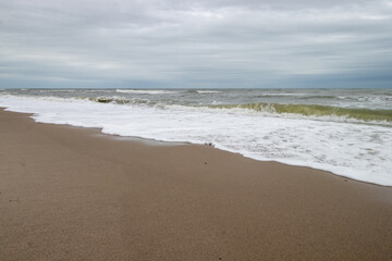 Waves and clouds at the beach