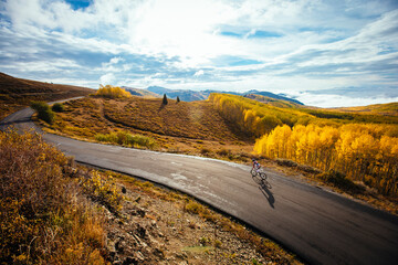 A man riding his road bike along Guardsmans Pass, Utah