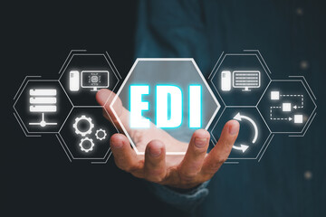 EDI, Electronic data interchange concept, Person hand holding Electronic data interchange icon on...
