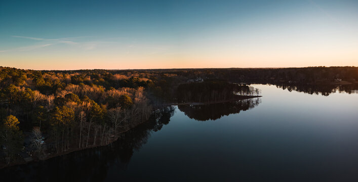 Beautiful aerial view of a lake at sunset, nature. ozark lakes, peachtree city.