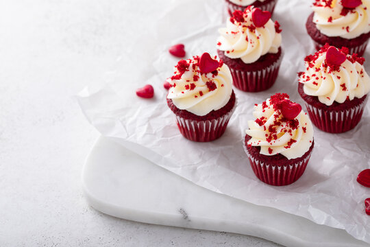 Red velvet cupcakes on a marble board