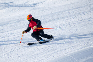 Fototapeta na wymiar People are having fun in downhill skiing and snowboarding