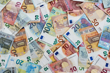Full frame money background with a lot of different euro banknotes, finance and business concept, high angle view from above