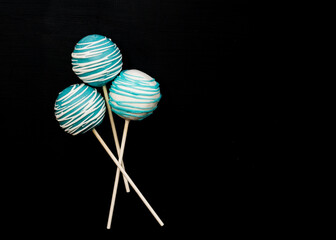 Teal and white cake pops
