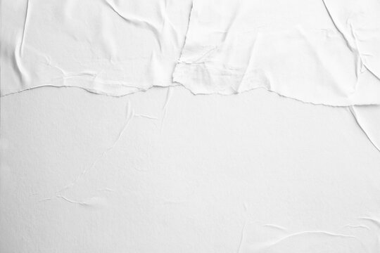 Texture of white torn paper poster, top view. Space for text © New Africa