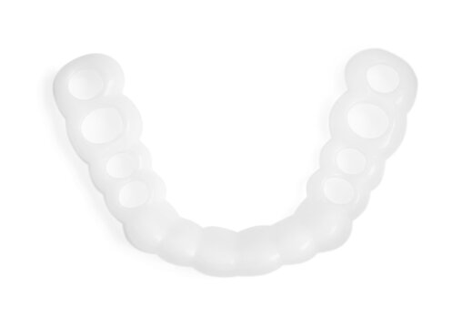 Dental mouth guard on white background, top view. Bite correction