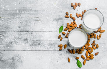 Almond milk in a glasses .