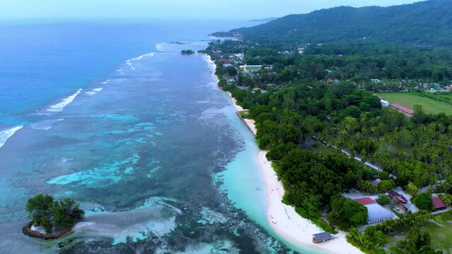Coral reef at Anse Source D Argent beach La Digue Island Seychelles aerial view on tropical beach Seychelles.