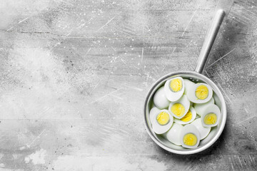 Boiled eggs in a saucepan.