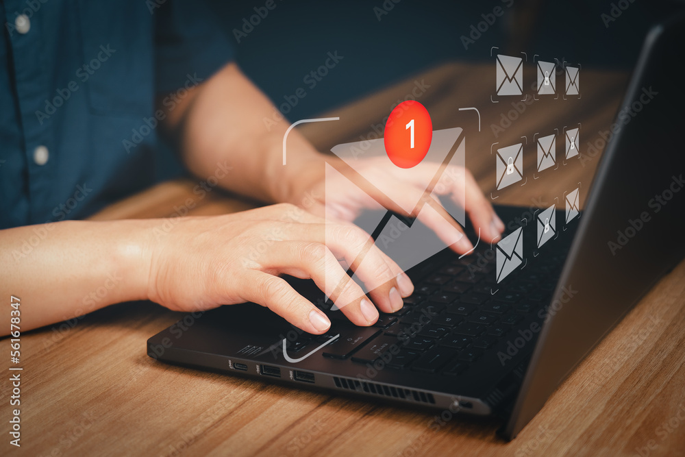 Poster adult man hand using computer laptop and sending online message with email icon, email marketing con