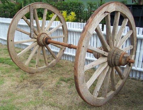 The old wooden cart wheels