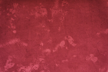 Viva Magenta toned colour grunge decorative navy dark wall background. Art rough stylized texture banner trendy color 2023. Grunge Viva Magenta color texture. High quality photo