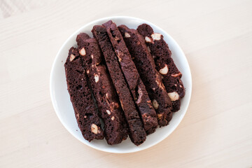 Homemade chocolate biscotti cookies ,Traditional Italian dessert on white plate