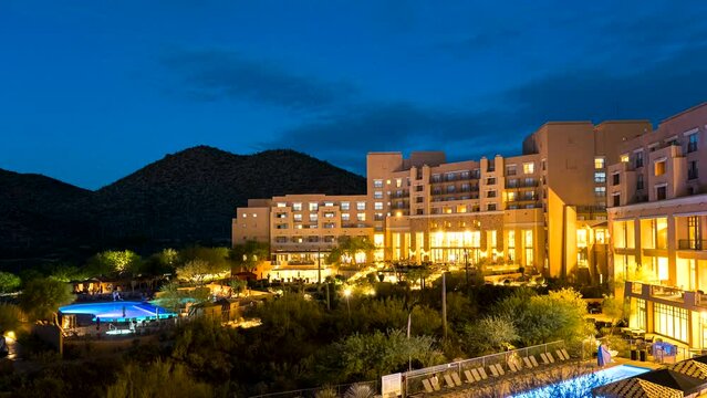 Time lapse of a cool blue sunrise over a hotel establishment in Tucson, Arizona.