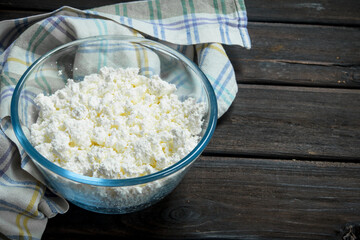 Cottage cheese in bowl .