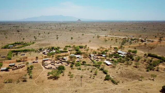 Panoramic aerial view of a village of Karamoja, also known as Manyatta or Ere, on a sunny day in Uganda, Africa.