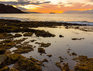 Fototapeta na wymiar Evening Light on The Tide Pools Along Oneuli Beach , Makena State Park, Maui, Hawaii, USA