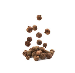 allspice in flight on a white background