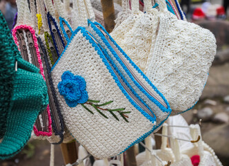 Handmade knitted bags produced by small home industries are souvenirs for tourists at the Mount Tangkuban Parahu tourist spot in Bandung, Indonesia. Sold in stalls around the crater.