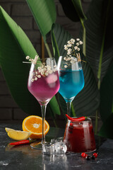 Three glasses of fresh iced cocktail in the bar