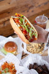 A view of a kimchi hot dog.