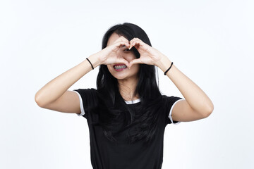 Showing Love Heart Sign Of Beautiful Asian Woman Isolated On White Background