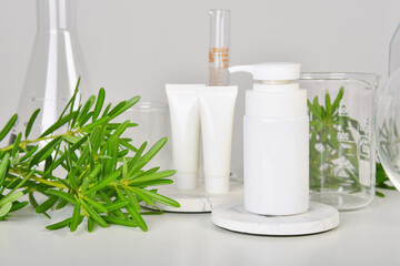 Natural skincare beauty product, Cosmetic white bottle containers packaging with green nature leaves, Blank label for organic spa branding mock-up,Herbal healthy skin care.