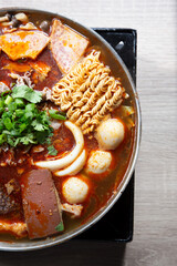 A top down view of a hot pot entree.