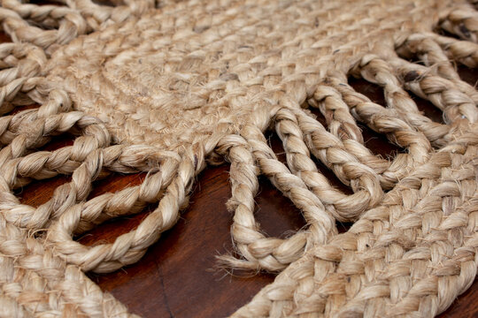 A View Of A Woven Burlap Straw Table Runner, As A Background.