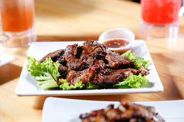 A view of a plate of crying tiger.