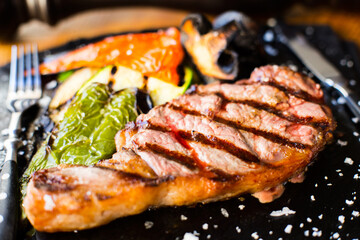 Top quality veal steak cooked to the point on the grill.