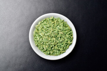 Top view of fennel seed on dark background