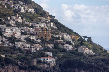 Fototapeta premium Touristic Town, Vettica Maggiore, on Rocky Cliffs and Mountain Landscape by the Tyrrhenian Sea. Amalfi Coast, Italy.