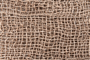 Cloth. The texture of the burlap fabric is close-up. Packaging material. Background Of Burlap Hessian Sacking