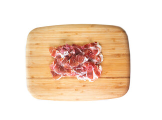 Iberico ham cut into slices. Iberian ham is a type of serrano ham from the Iberian pig, highly regarded in Spanish gastronomy