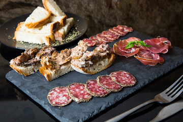 Table of Iberian sausages such as ham, salchichón, lomo and other Spanish delicatessen.