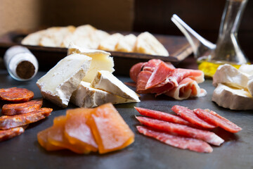 Table of Iberian sausages such as ham, salchichón, lomo and other Spanish delicatessen.