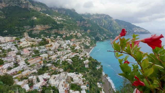 Touristic Town, Positano, on Rocky Cliffs and Mountain Landscape by the Tyrrhenian Sea. Amalfi Coast, Italy. Slow Motion Cinematic Pan