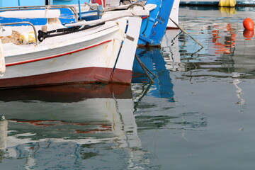 Fototapeta na wymiar Berth on the seashore for mooring boats and yachts.
