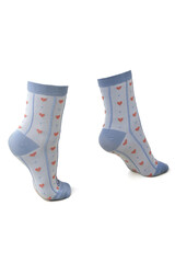 Subject shot. High blue cotton socks with a dense toe and a heel. The socks are decorated with an ornament of small hearts in red and yellow.  The socks are isolated on a white background. Back view.